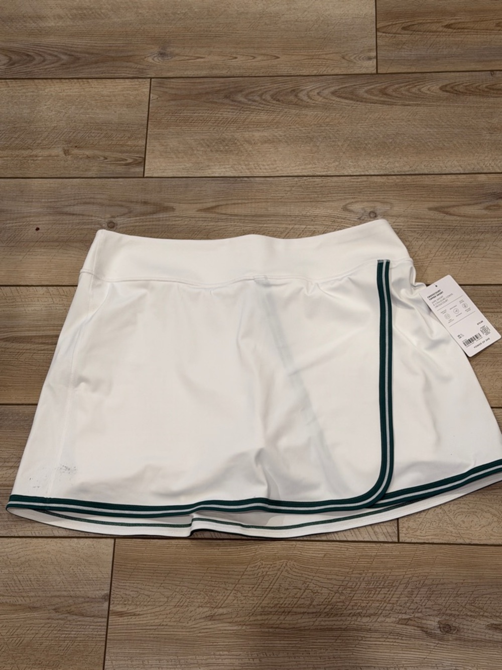 White Women’s Tennis Skort with Green Trim - Athleta